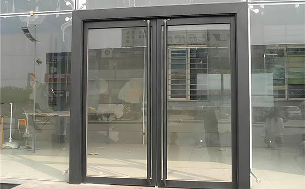 柯坪玻璃地弹门